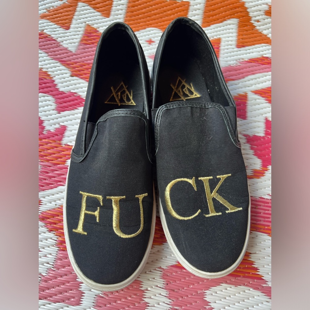 Black FU CK Slip-on sneakers, women’s size 9.